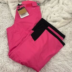 The North Face girls size 10 (Medium) freedom ski pant in the color Mr.Pink